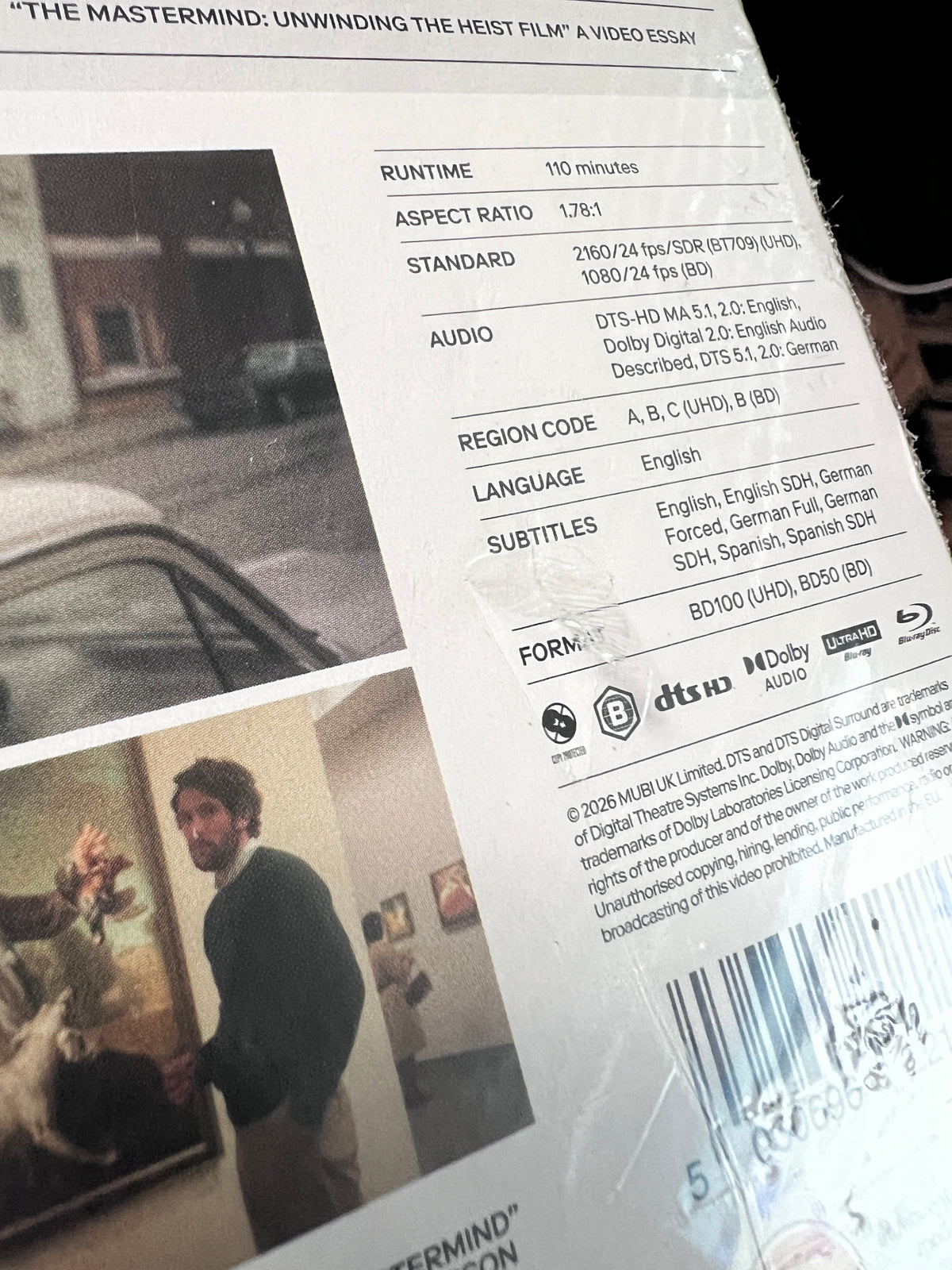 Gouges on back slipcover of Damaged | The Mastermind (UK Import) [4K Ultra HD]