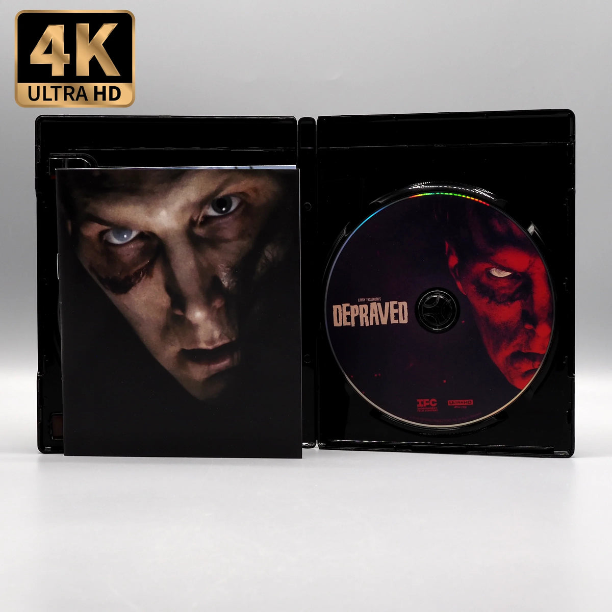 Open case showing discs of Depraved [4K Ultra HD + Blu-ray Set]