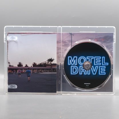 Open case showing disc art of Motel Drive [Blu-ray]