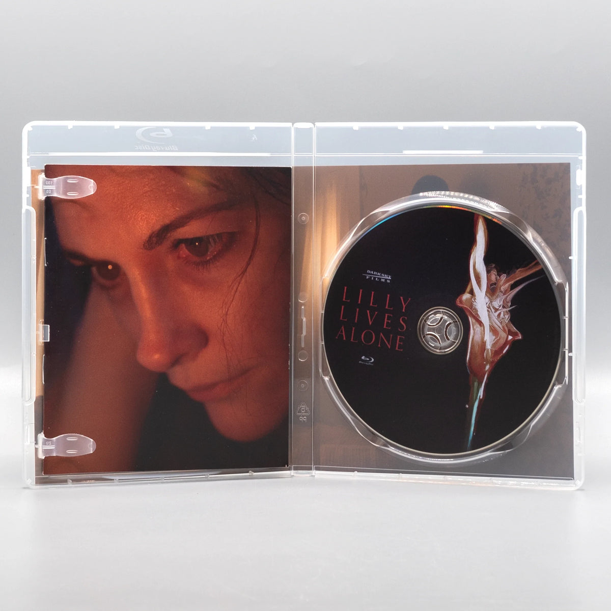 Open case showing disc art of Lilly Lives Alone [Blu-ray]