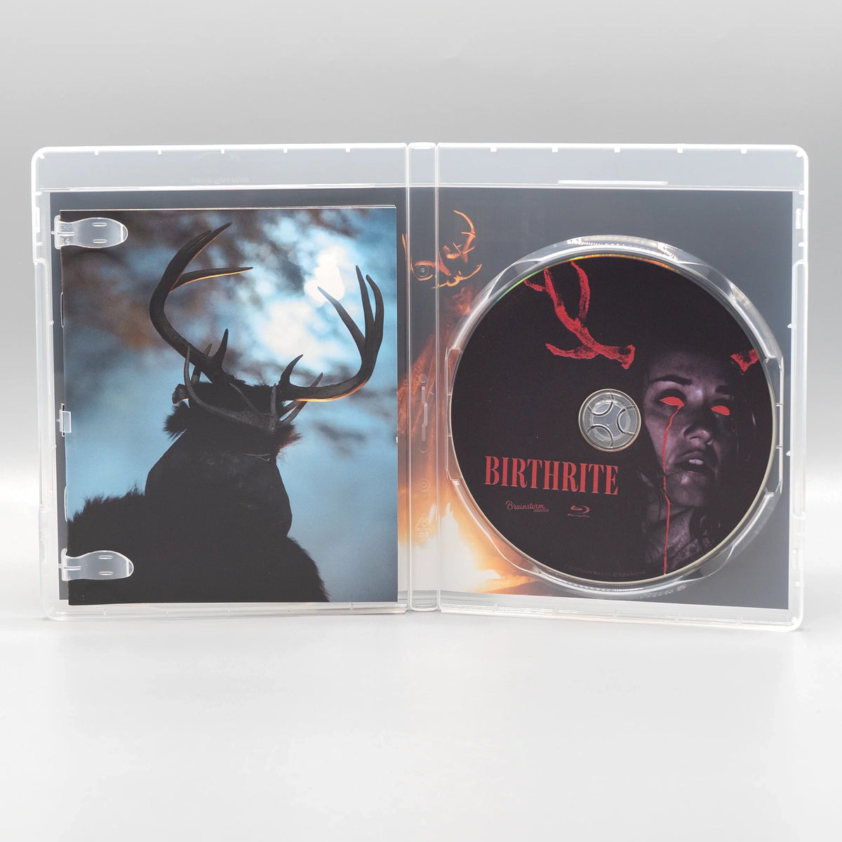 Open case showing disc art of Birthrite [Blu-ray]