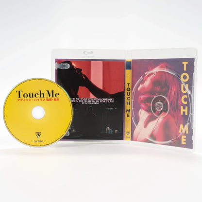 Open case showing disc art of Touch Me [Blu-ray]