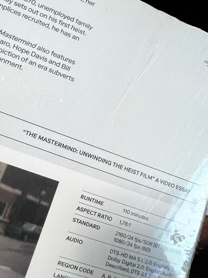 Gouges on back slipcover of Damaged | The Mastermind (UK Import) [4K Ultra HD]