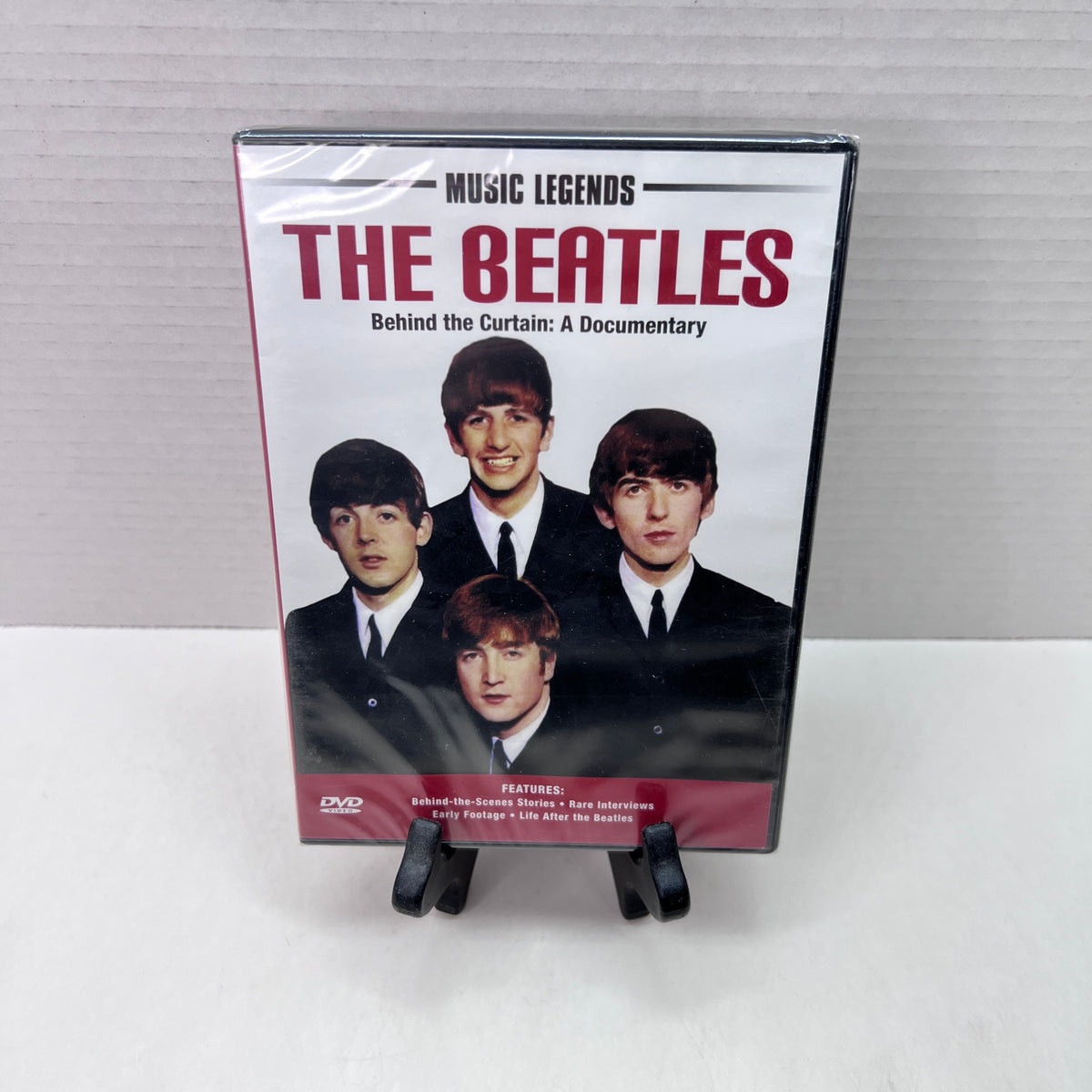 Front cover of The Beatles: Behind the Curtain – A Documentary [DVD]