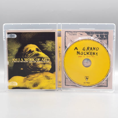 Open case showing disc art of A Grand Mockery [Blu-ray]