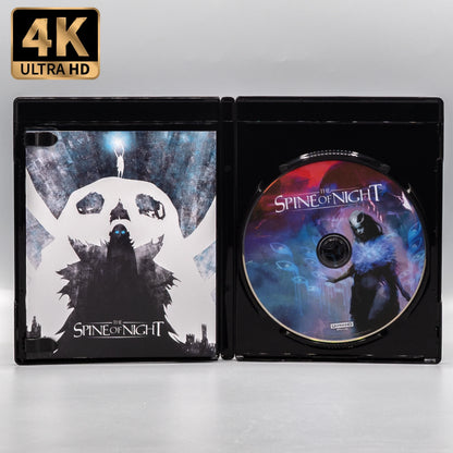 Open case showing disc art of The Spine of Night [4K Ultra HD + Blu-ray]