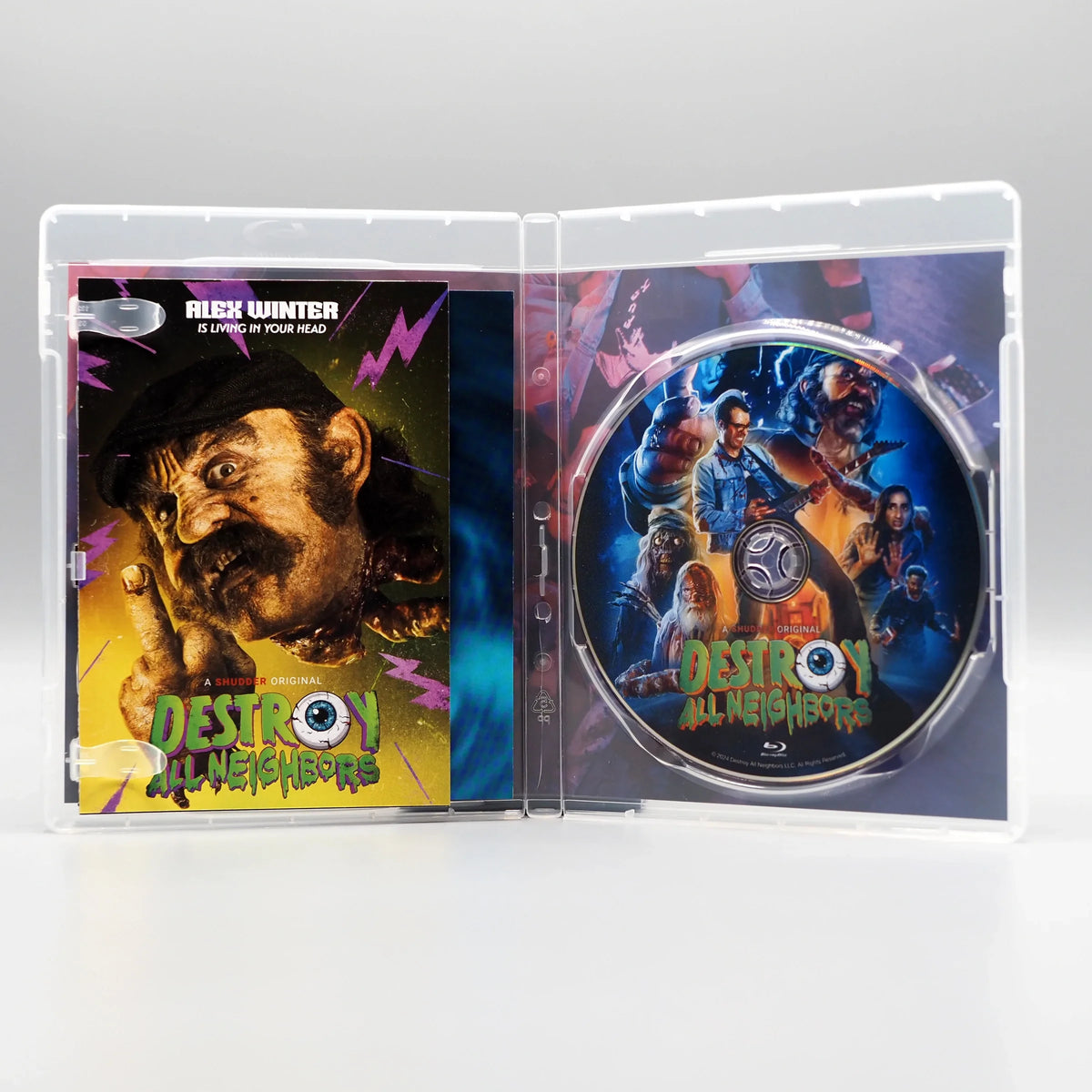 Open case showing discs of Destroy All Neighbors [Blu-ray]