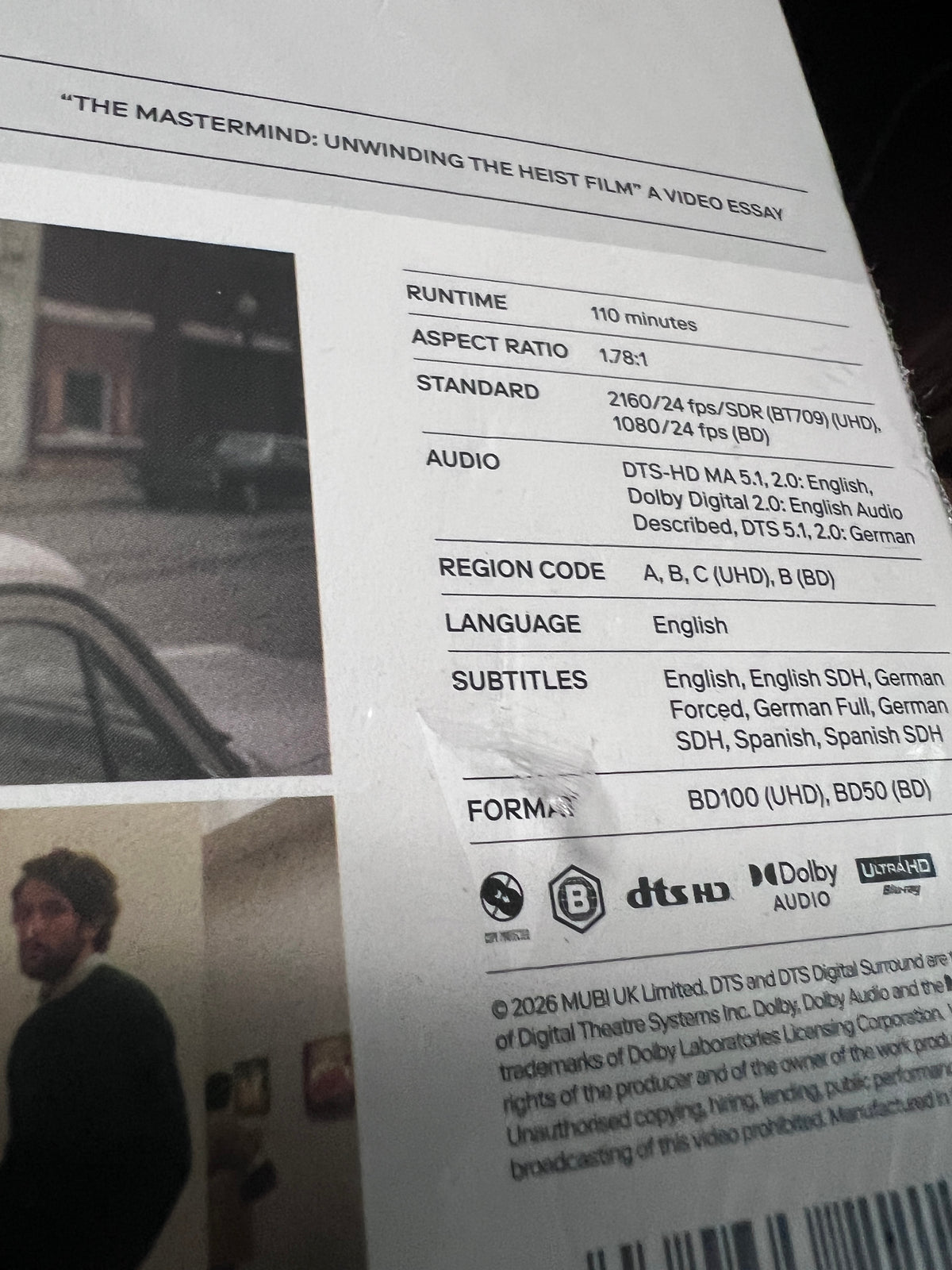 Gouges on back slipcover of Damaged | The Mastermind (UK Import) [4K Ultra HD]