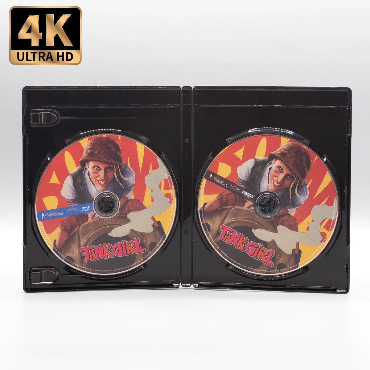 Open case showings discs of Tank Girl [4K Ultra HD + Blu-ray]