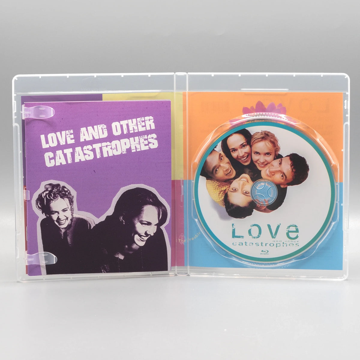 Open case showing disc art of Love and Other Catastrophes [Blu-ray]