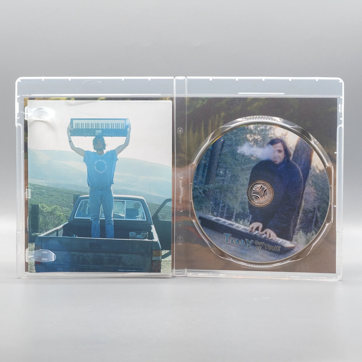 Open case showing disc art of Teddy, Out of Tune [Blu-ray]