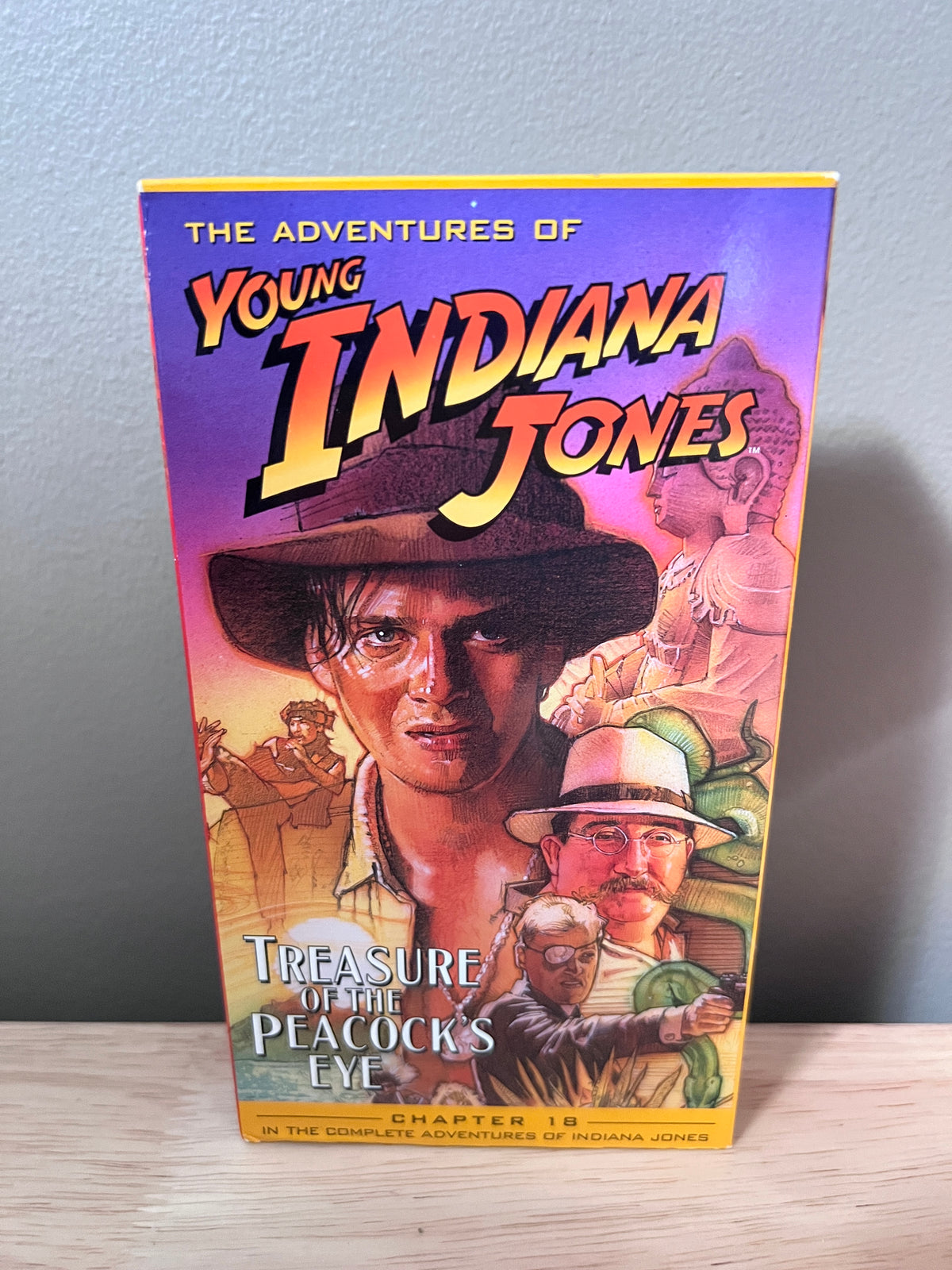 Front packaging of The Adventures of Young Indiana Jones: Treasure of the Peacock's Eye VHS
